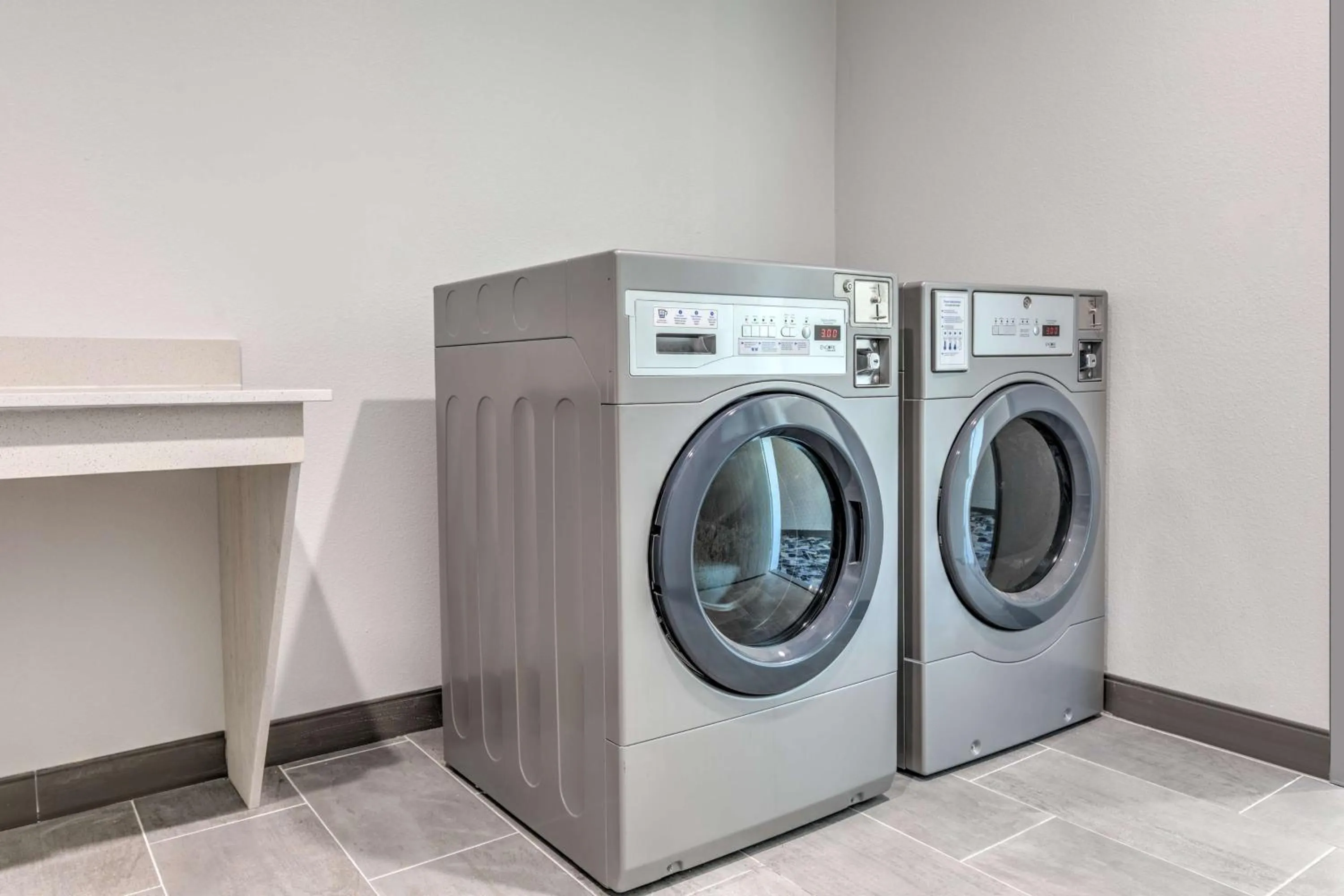 laundry in Hampton Inn & Suites by Hilton Shenandoah The Woodlands