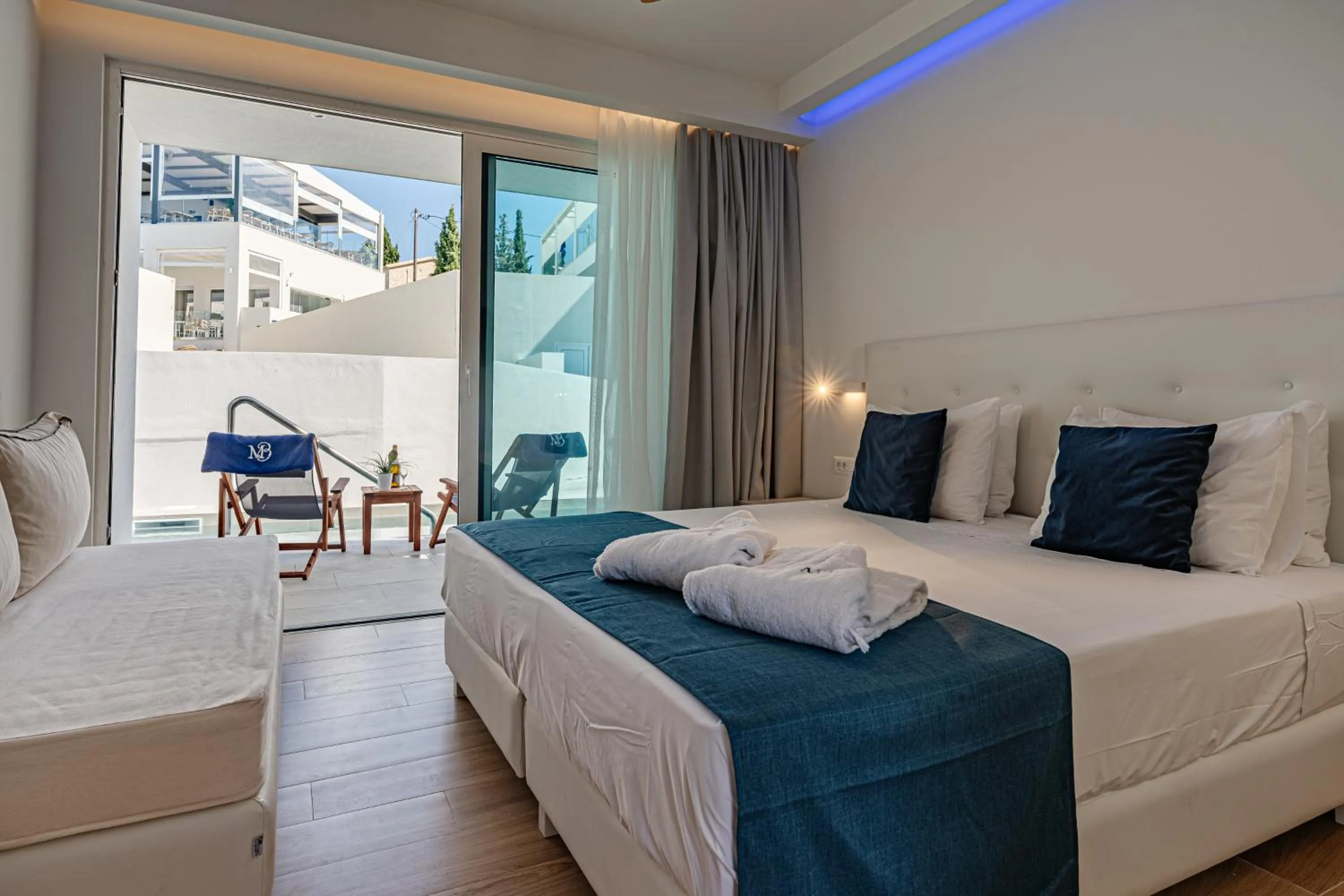 Bed in Magique Bleu Suites
