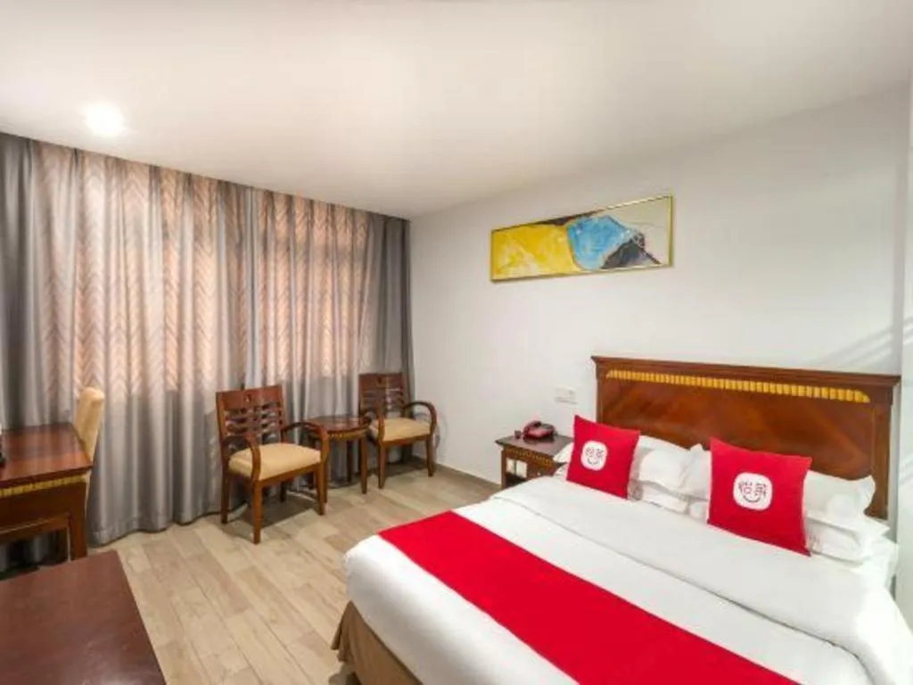 Bed in Nantong GuoDu Hotel