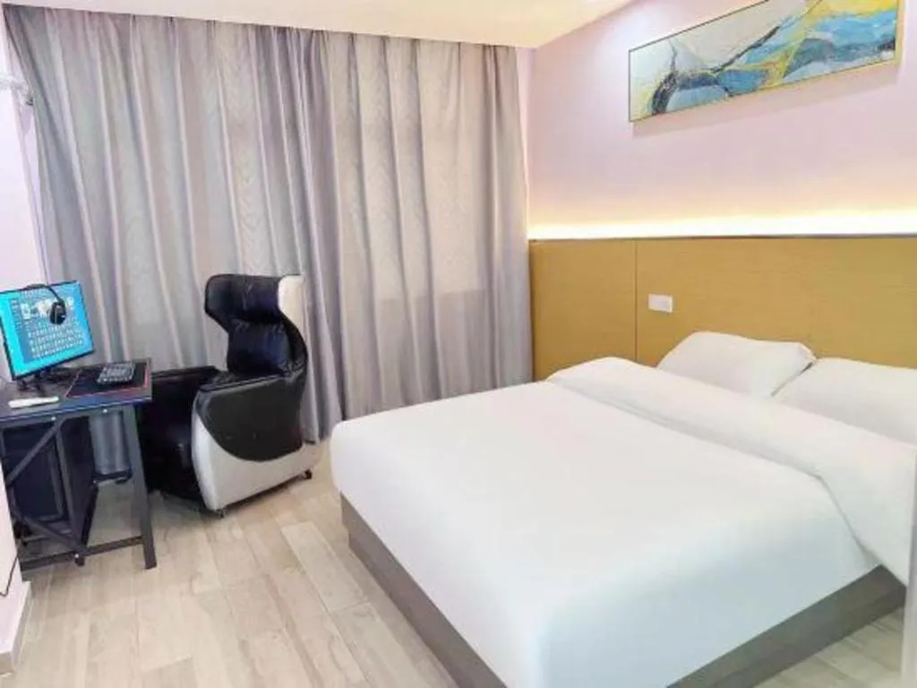 Bed in Nantong GuoDu Hotel