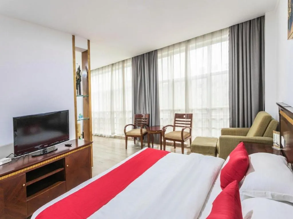 Bed in Nantong GuoDu Hotel