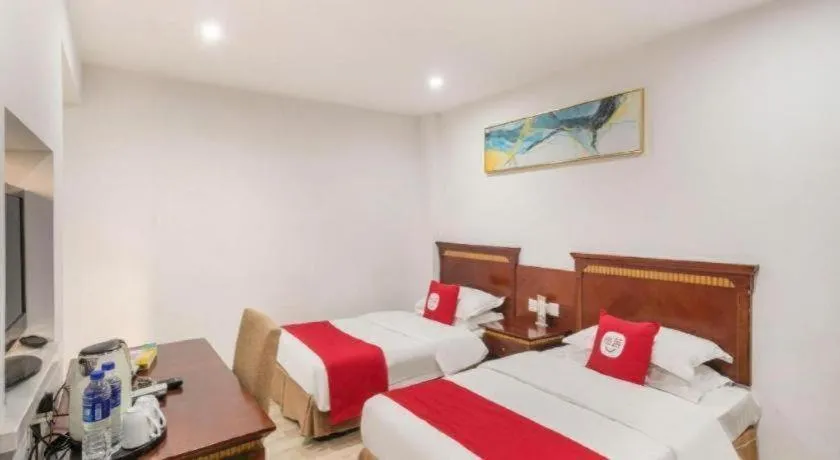 Bed in Nantong GuoDu Hotel