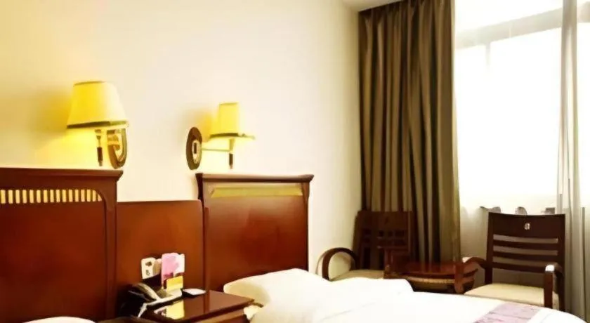 Bed in Nantong GuoDu Hotel