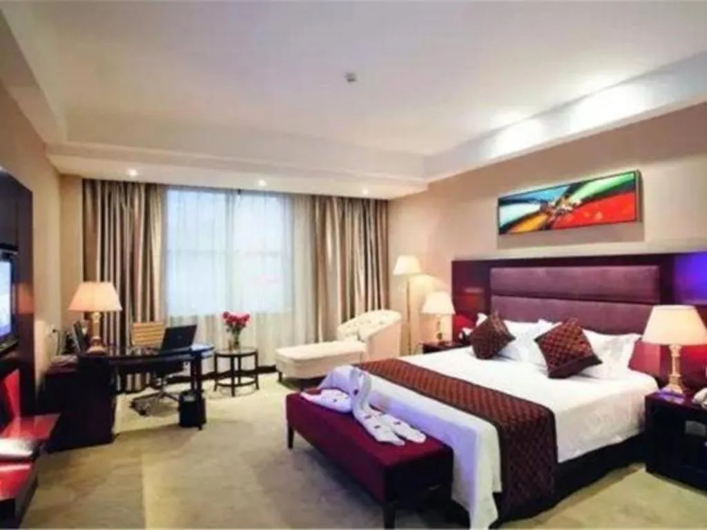 Bed in Zhongzhou International Hotel