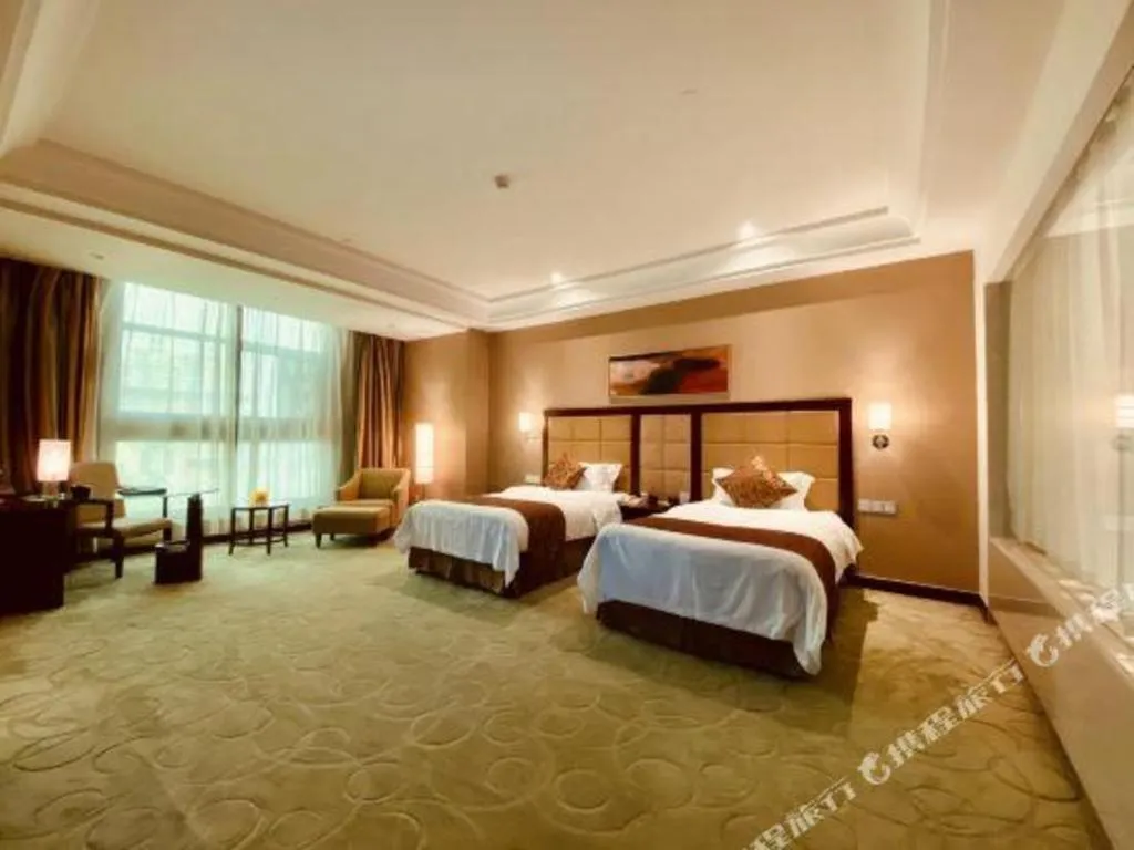 Bed in Zhongzhou International Hotel