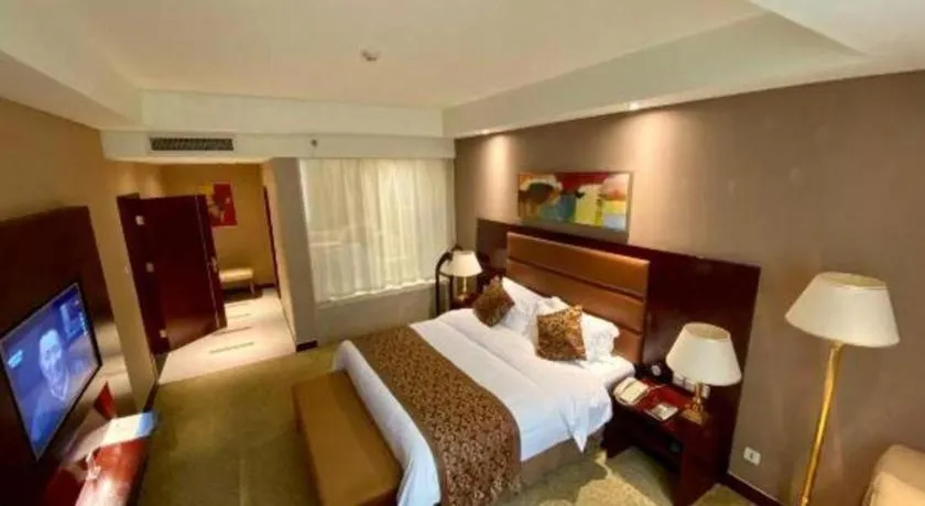 Bed in Zhongzhou International Hotel