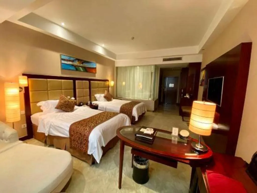 Bed in Zhongzhou International Hotel