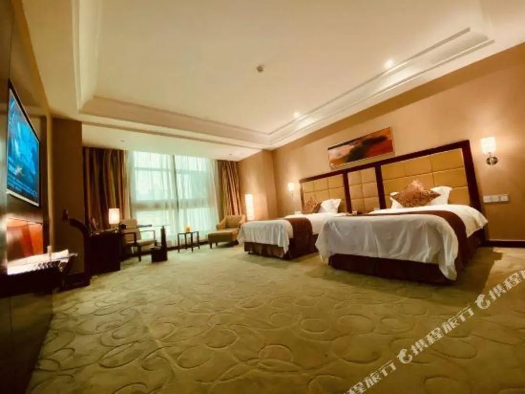 Bed in Zhongzhou International Hotel