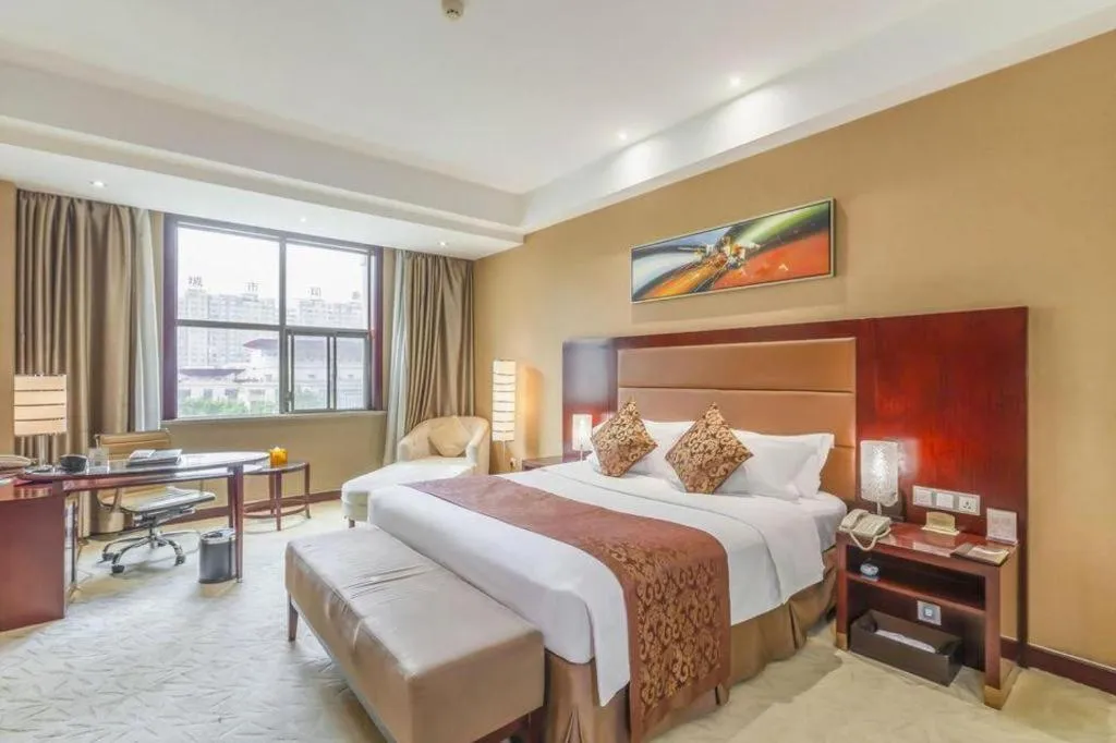 Bed in Zhongzhou International Hotel
