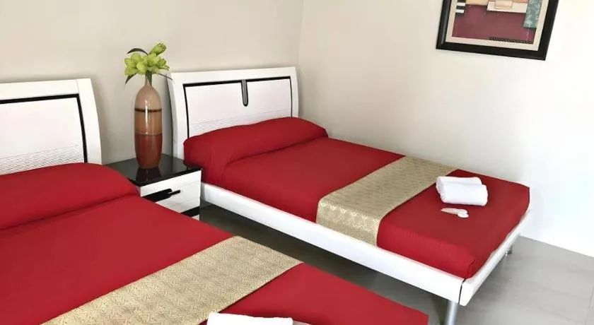 Bed in Quezon Premier Hotel - Candelaria