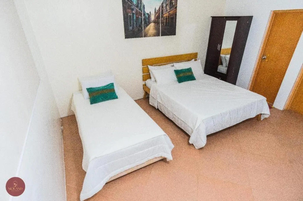 Bed in Quezon Premier Hotel - Candelaria