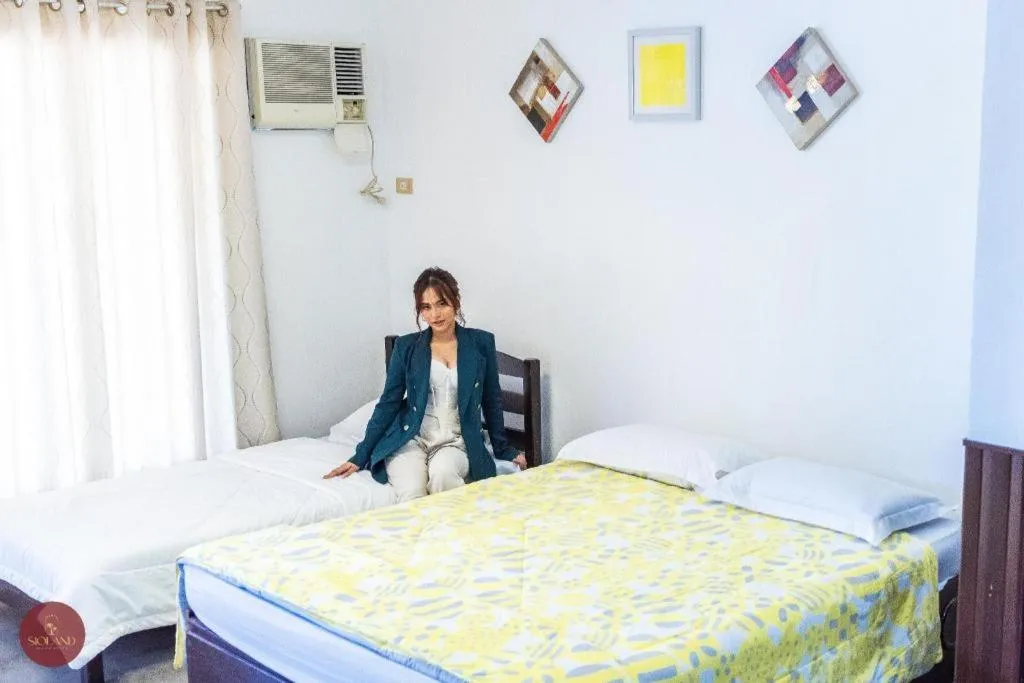 Bed in Quezon Premier Hotel - Candelaria