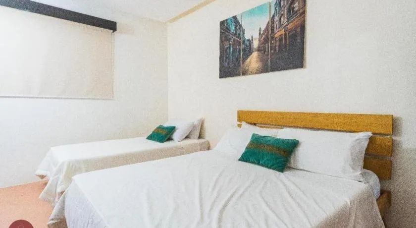 Bed in Sioland Grand Premier Hotel Candelaria