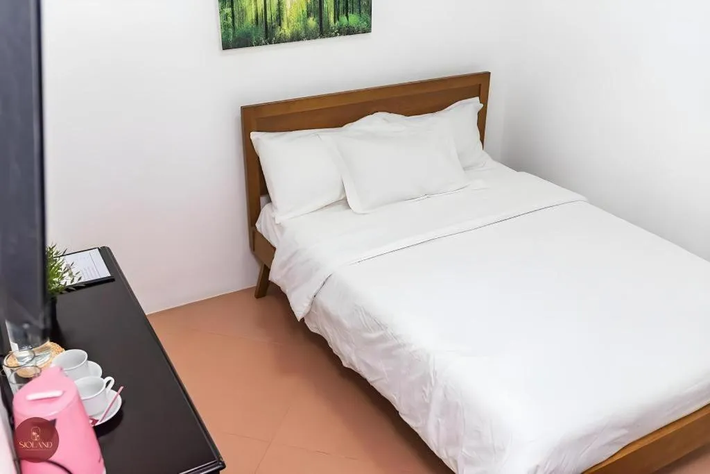 Bed in Quezon Premier Hotel - Candelaria