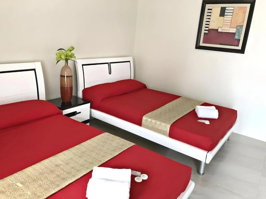 Bed in Quezon Premier Hotel - Candelaria