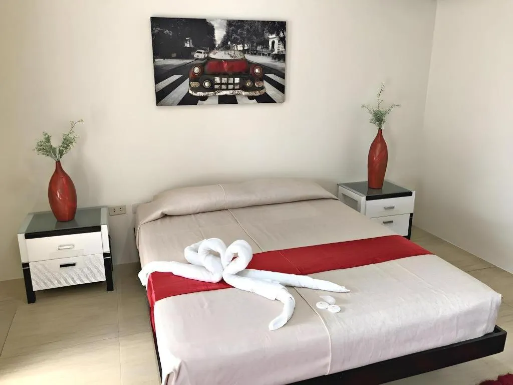 Bed in Quezon Premier Hotel - Candelaria