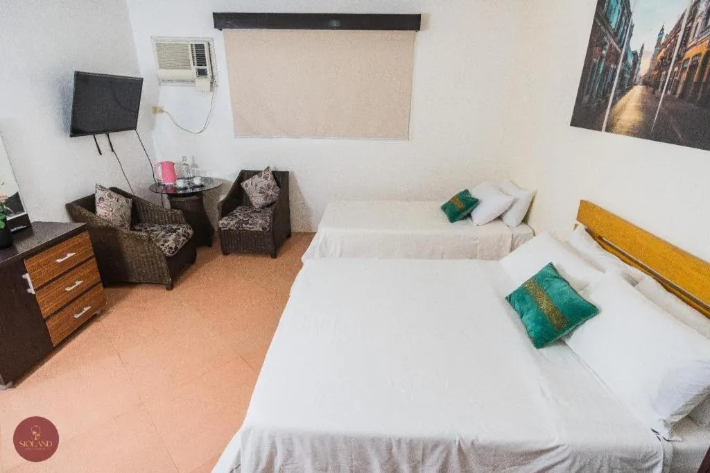 Bed in Quezon Premier Hotel - Candelaria