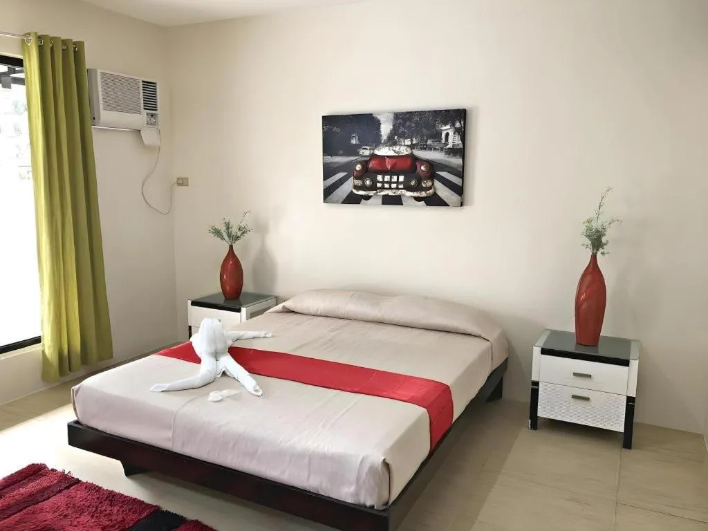 Bed in Quezon Premier Hotel - Candelaria