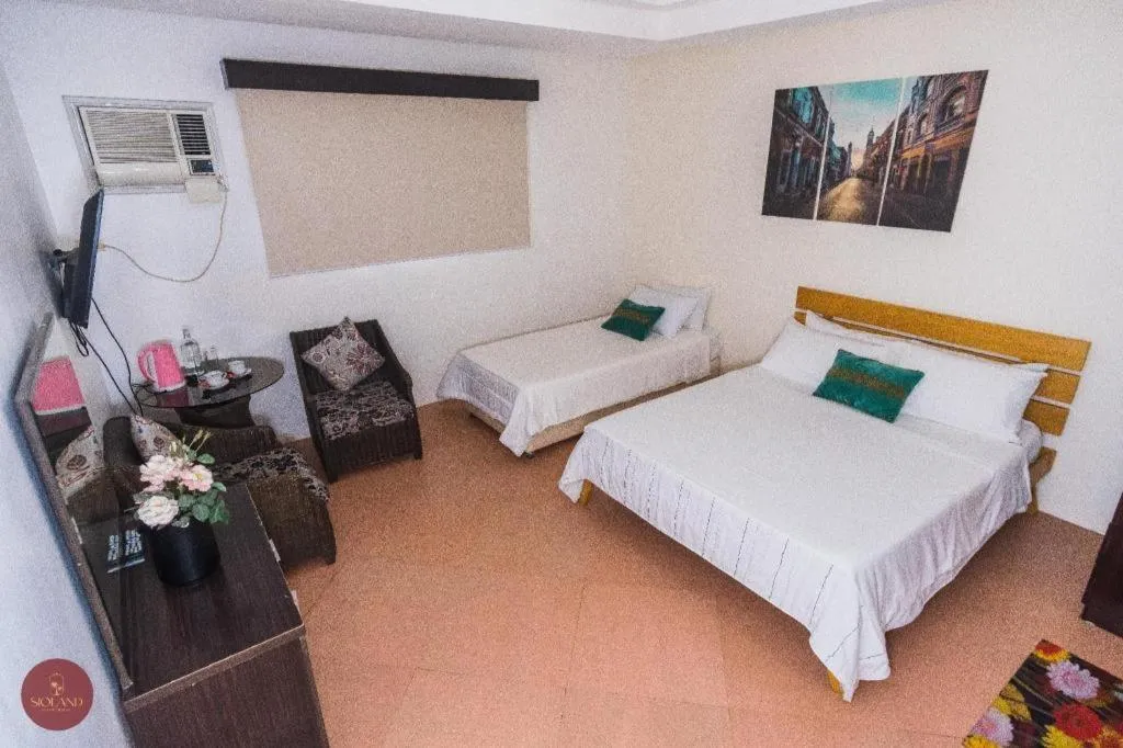 Bed in Quezon Premier Hotel - Candelaria