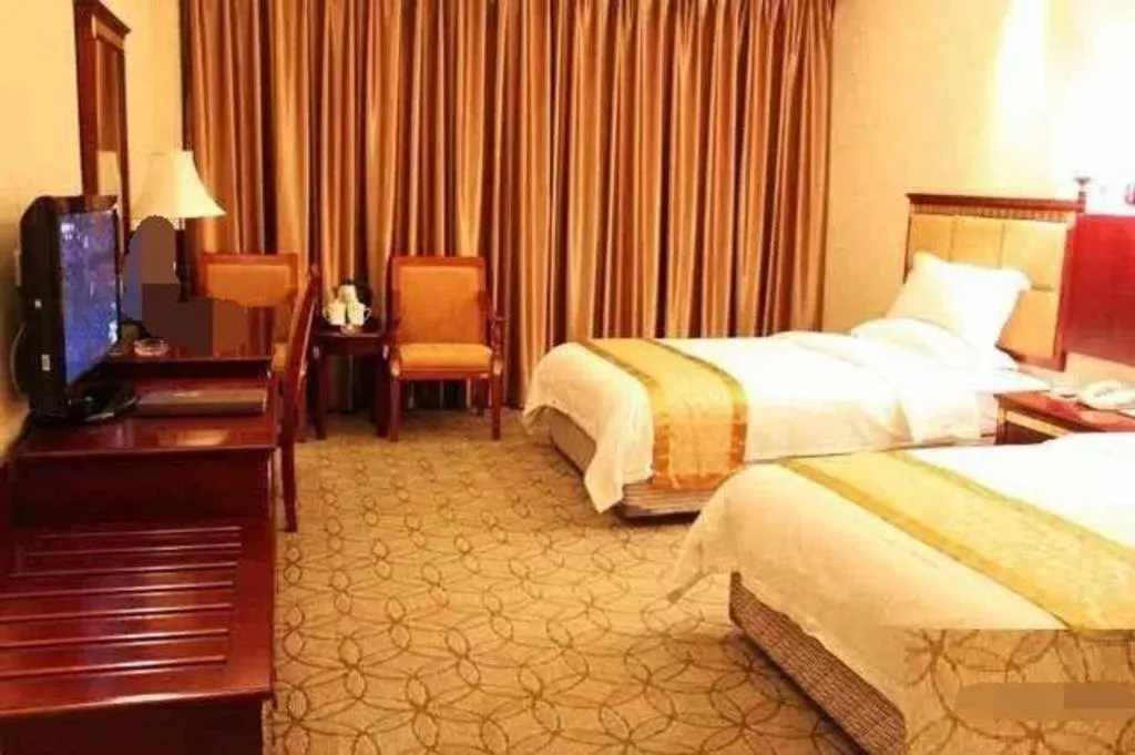 Bed in Shengshi Jinhua Hotel