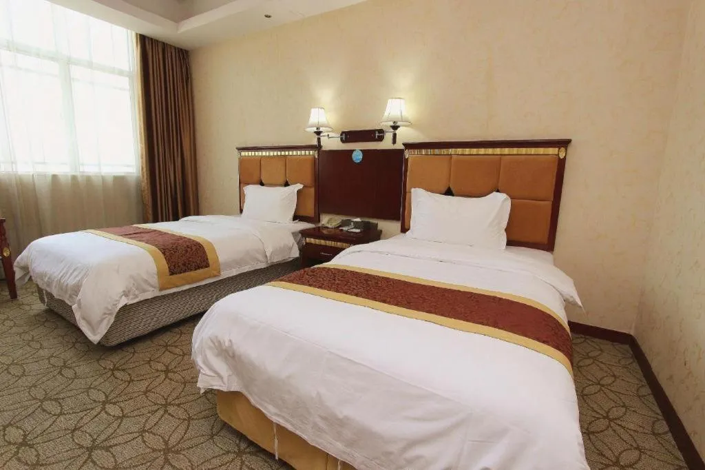 Bed in Shengshi Jinhua Hotel