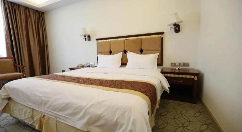 Bed in Shengshi Jinhua Hotel