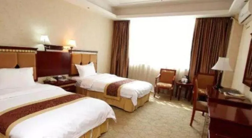 Bed in Shengshi Jinhua Hotel