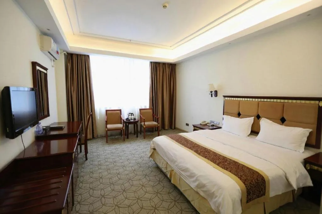 Bed in Shengshi Jinhua Hotel