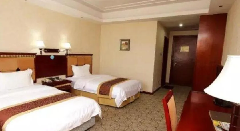Bed in Shengshi Jinhua Hotel