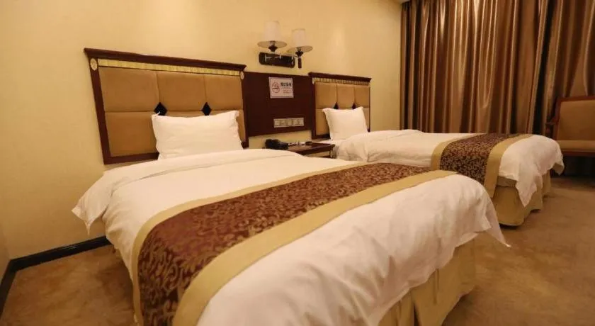 Bed in Shengshi Jinhua Hotel