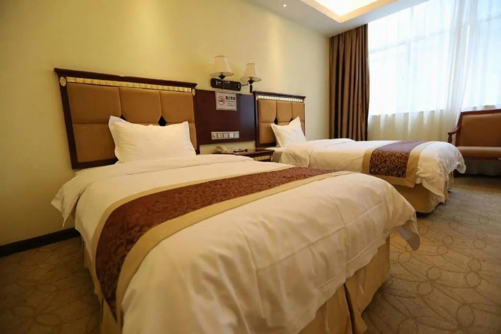 Bed in Shengshi Jinhua Hotel