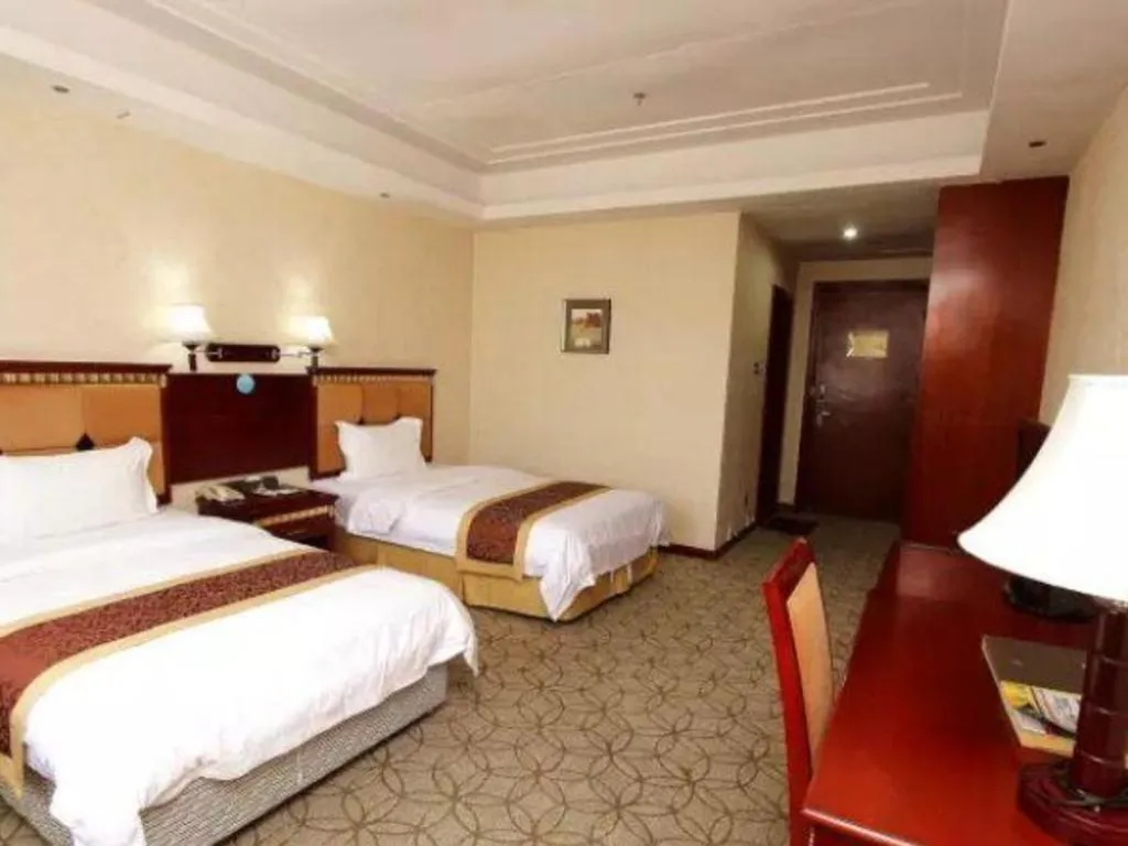 Bed in Shengshi Jinhua Hotel
