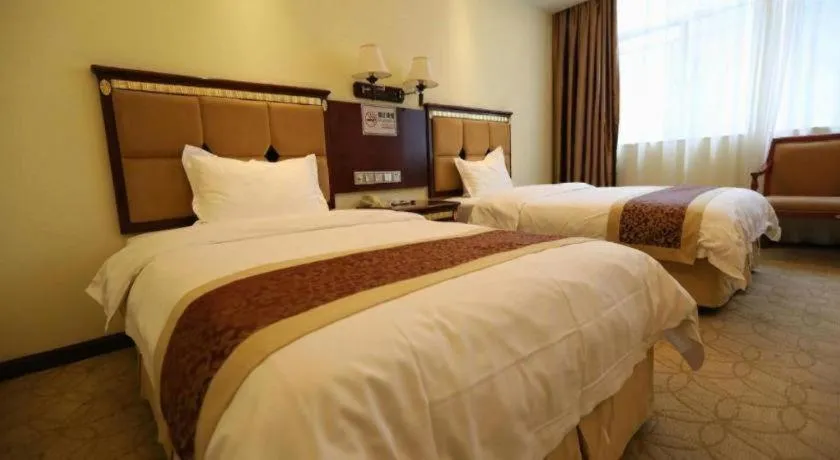 Bed in Shengshi Jinhua Hotel