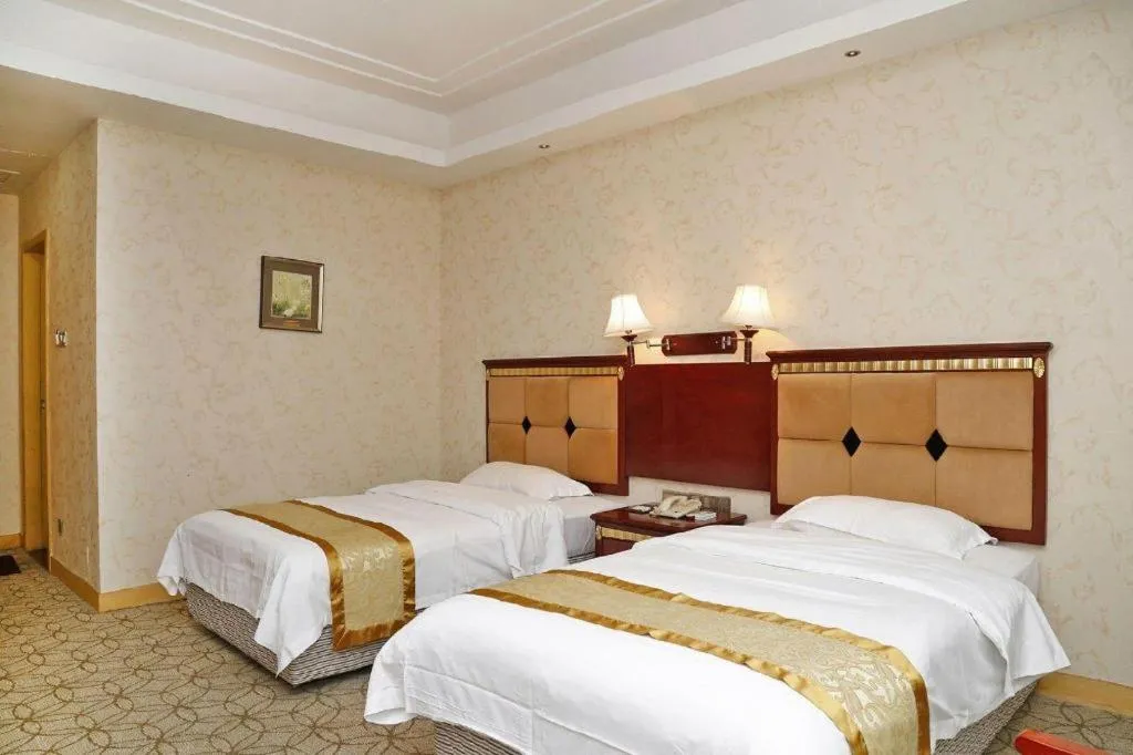 Bed in Shengshi Jinhua Hotel