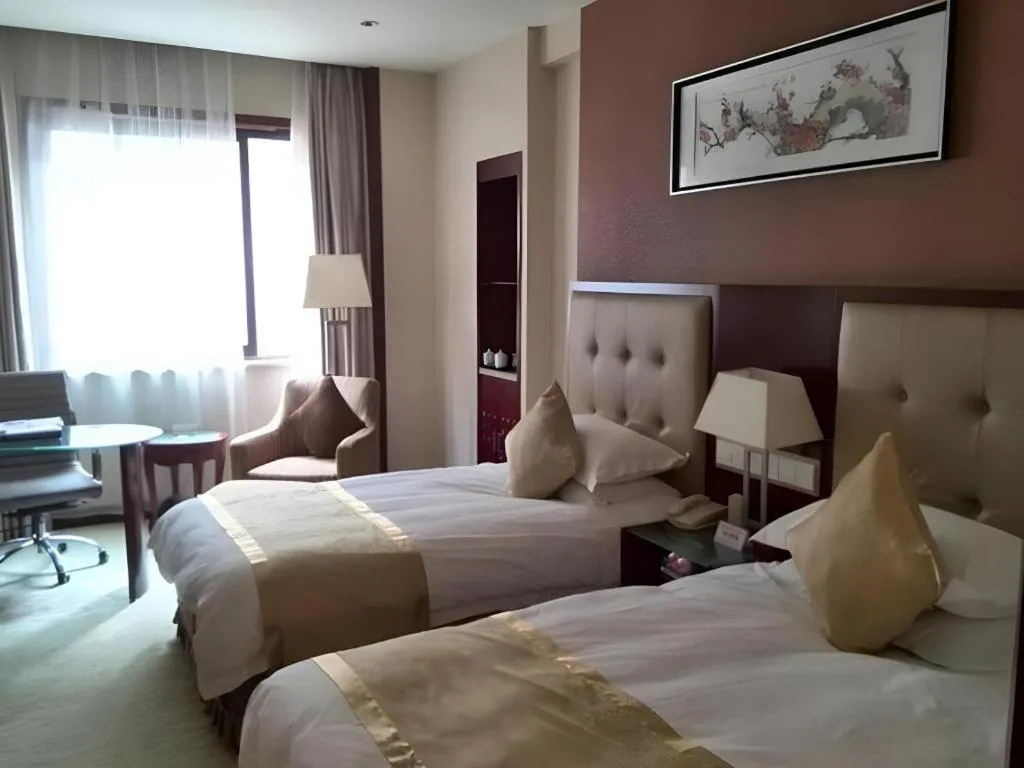Bed in Shaoxing Yintai Hotel