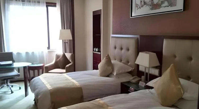 Bed in Shaoxing Yintai Hotel