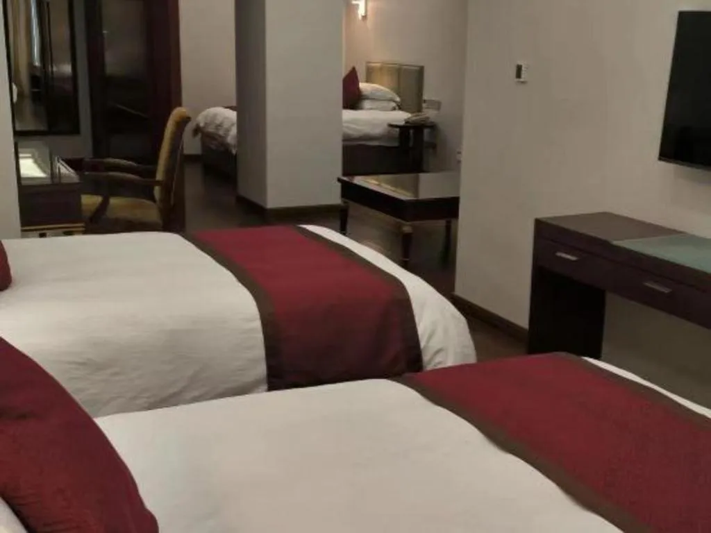 Bed in Shaoxing Yintai Hotel