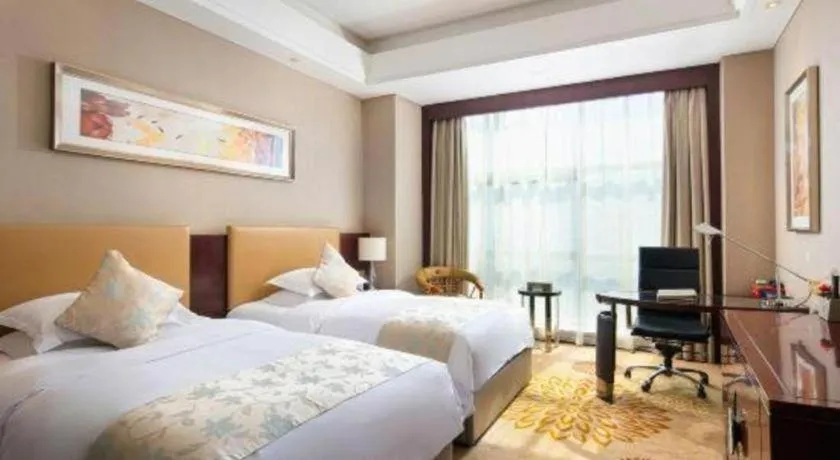 Bed in Zhengzhou Swan City International Hotel