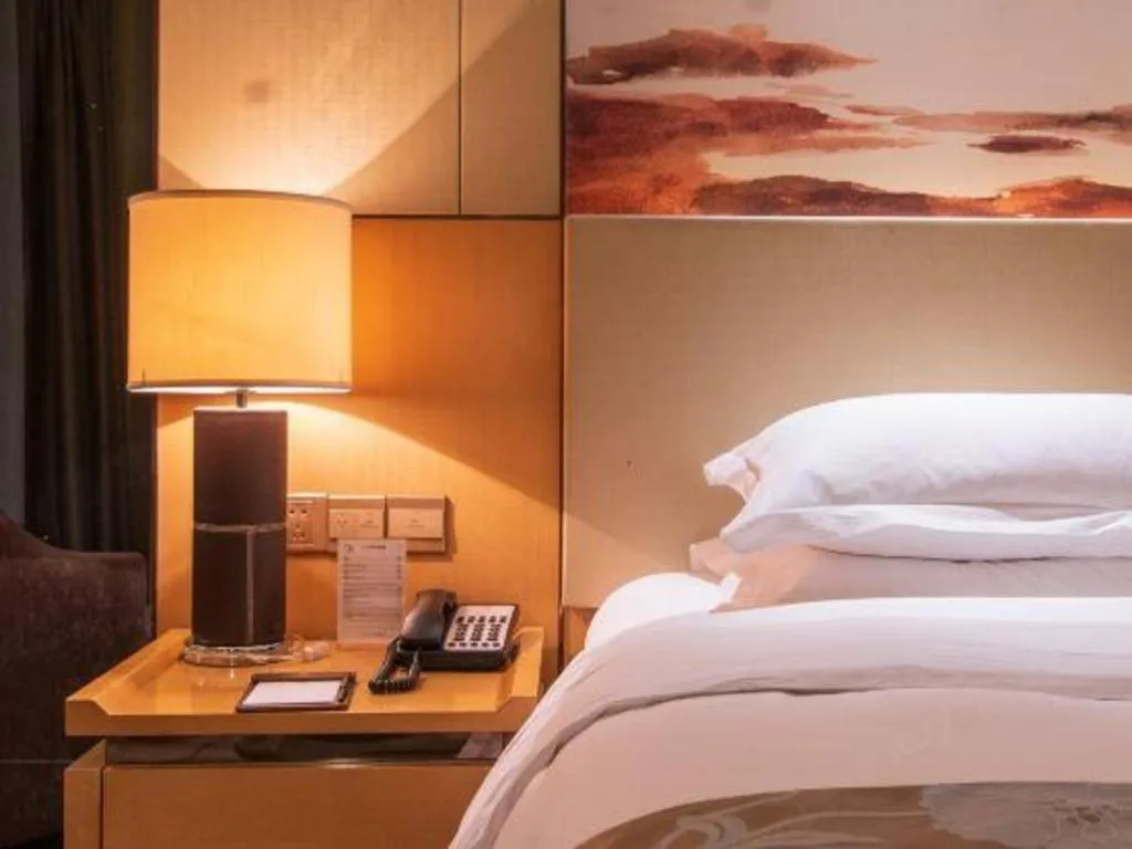 Bed in Zhengzhou Swan City International Hotel