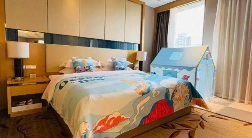 Bed in Zhengzhou Swan City International Hotel