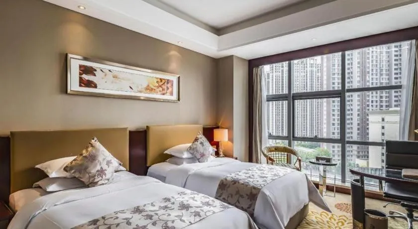 Bed in Zhengzhou Swan City International Hotel