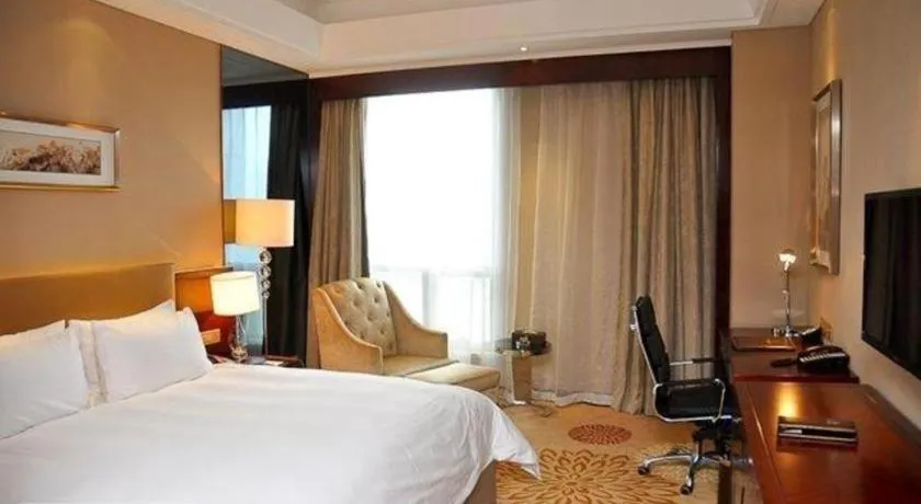 Bed in Zhengzhou Swan City International Hotel