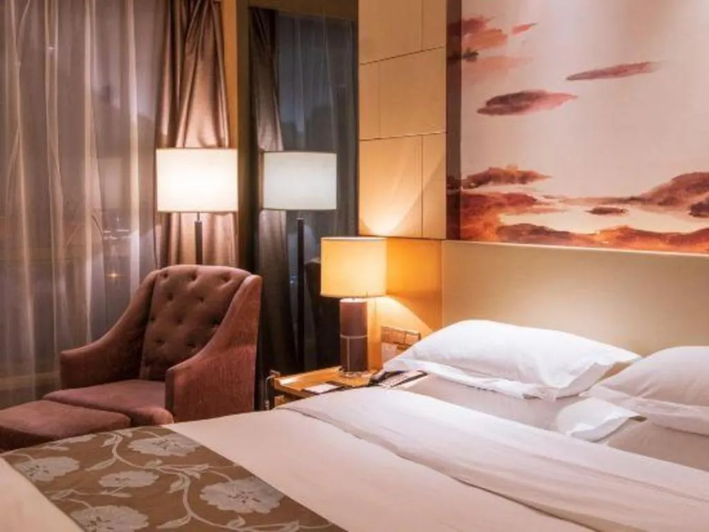 Bed in Zhengzhou Swan City International Hotel