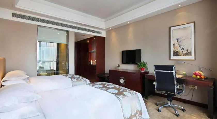 Bed in Zhengzhou Swan City International Hotel