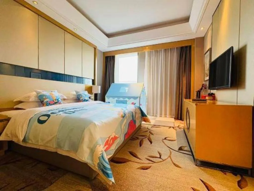 Bed in Zhengzhou Swan City International Hotel