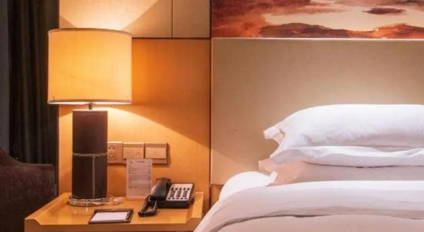 Bed in Zhengzhou Swan City International Hotel