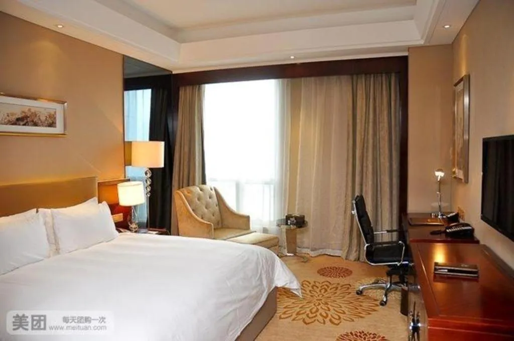 Bed in Zhengzhou Swan City International Hotel