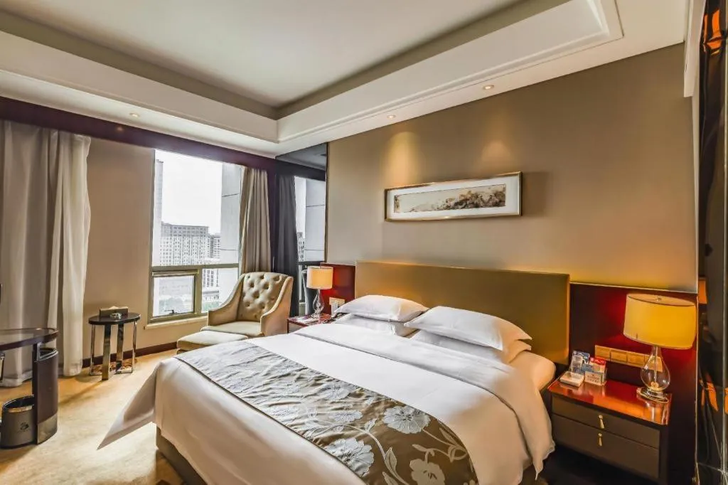 Bed in Zhengzhou Swan City International Hotel