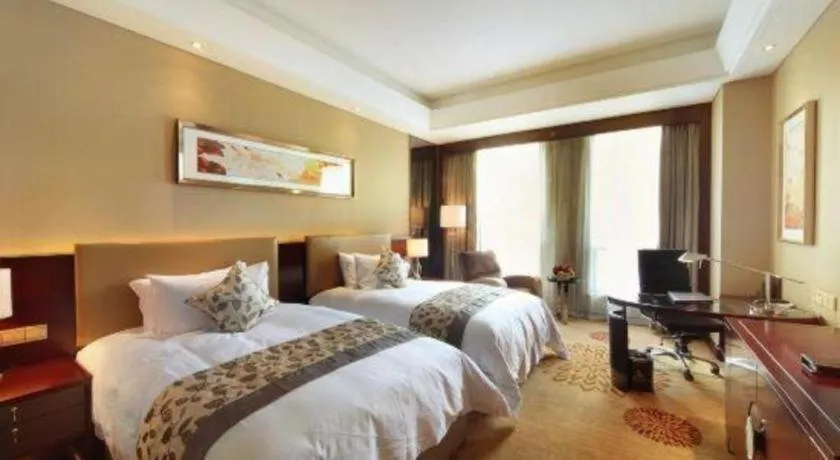 Bed in Zhengzhou Swan City International Hotel
