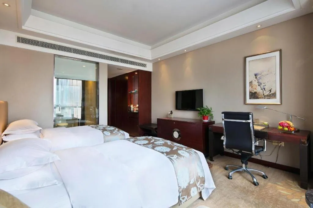 Bed in Zhengzhou Swan City International Hotel